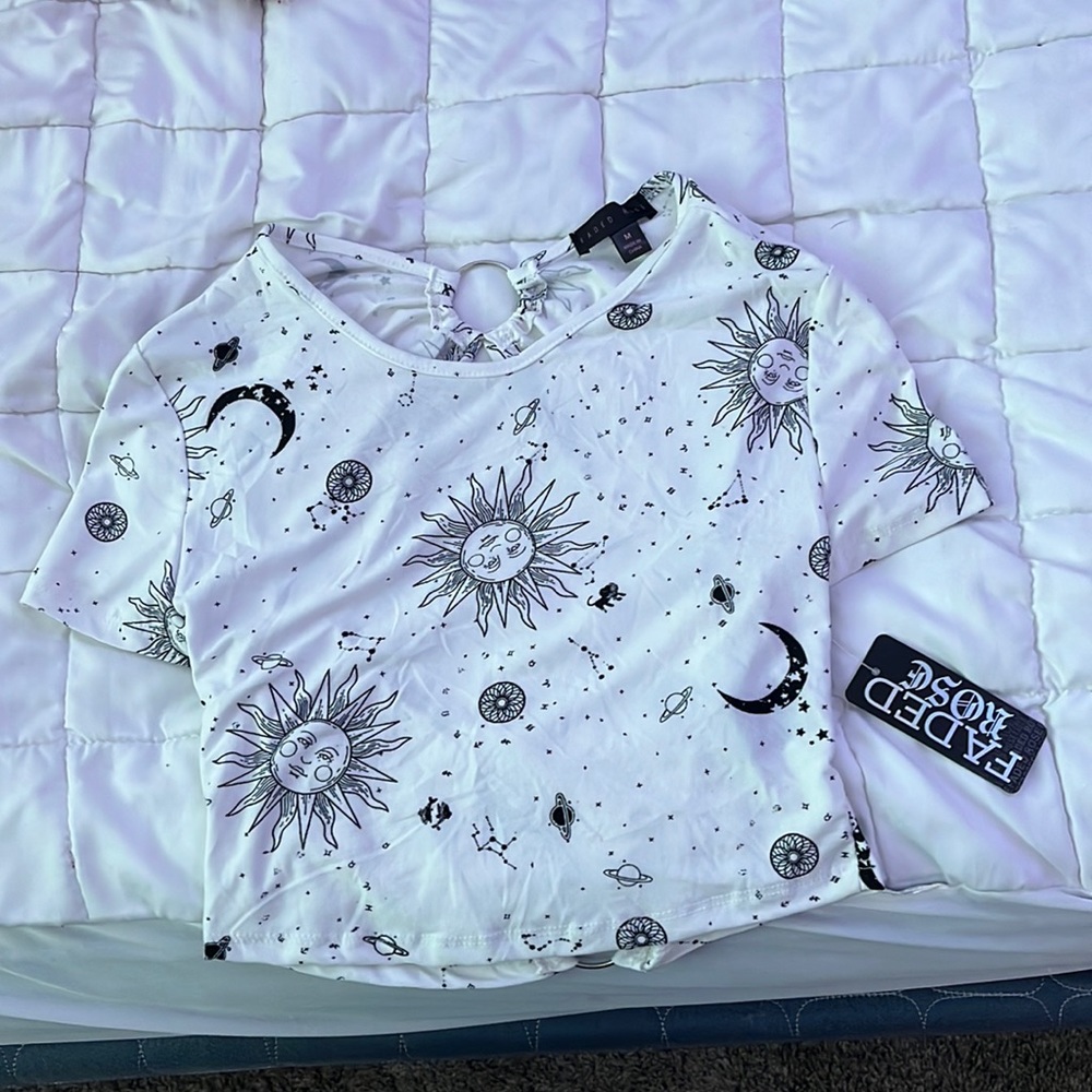 Crop top, brand is faded rose, never been worn still has the tag on it